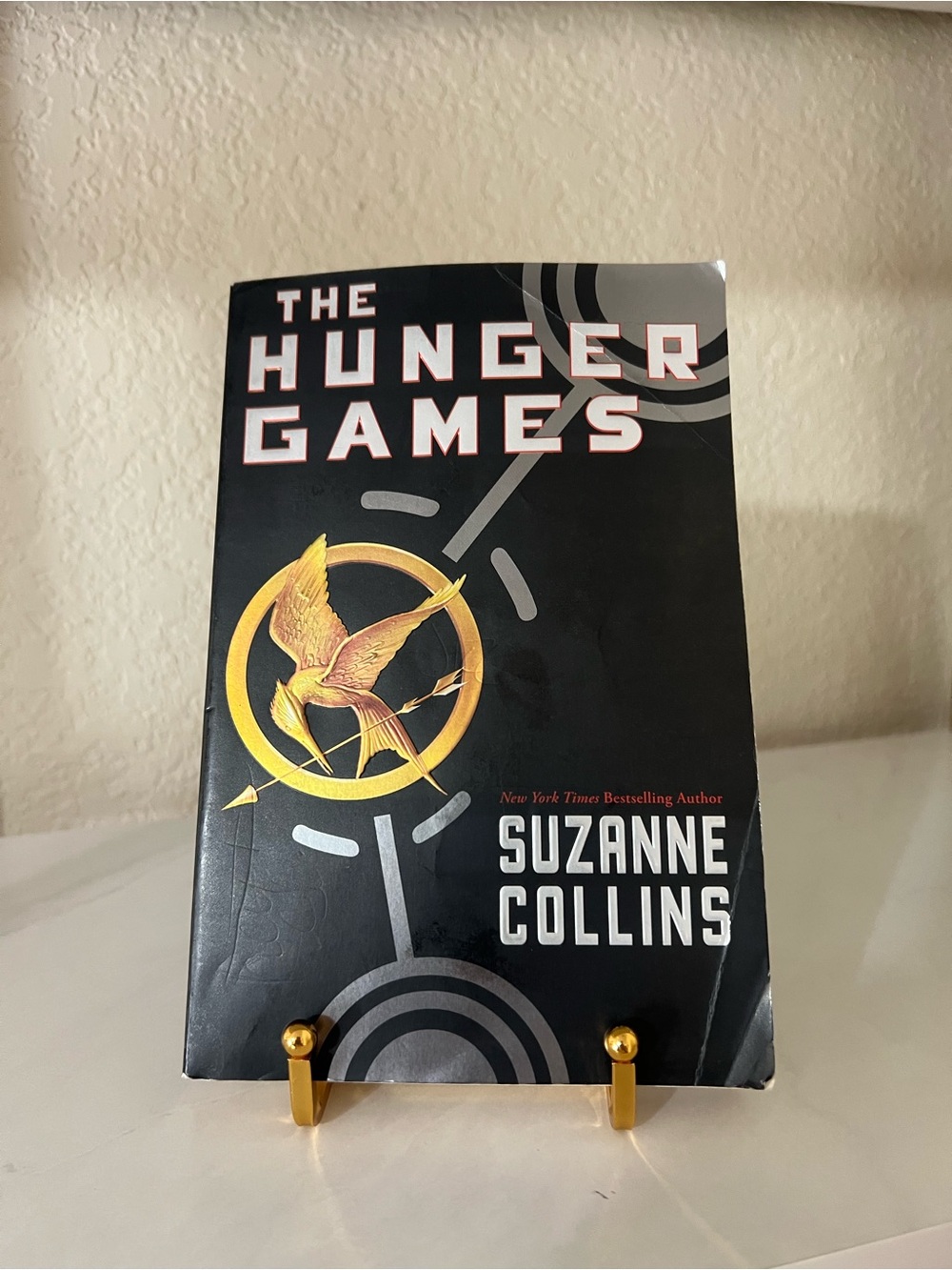 Scholastic The Hunger Games by Suzanne Collins- Black & Gold Cover